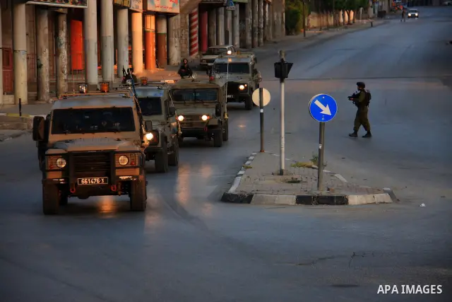 Israeli soldiers take a positions during clashes with Palestinians after Jews pray at the biblical Joseph's Tomb in the West Bank city of Nablus early on May 30, 2011. Photo by Wagdi Eshtayah