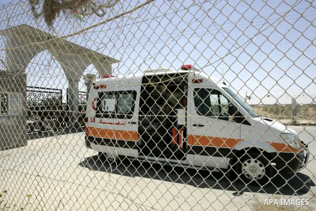Palestinian ambulance in front of the Rafah border crossing in the southern Gaza Strip on May 30, 2011. Egypt eased travel restrictions for residents of Gaza from Saturday, and eroding a blockade that imposed by Israel o...