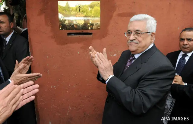 Palestinian President Mahmoud Abbas (Abu Mazen) during removes the curtain on the panel of the Palestinian diplomatic mission in Italy, in front of the Mission's headquarters in Rome, on Jun 1, 2011. photo by Thaer Ganai...