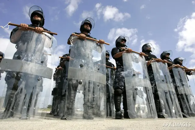 Palestinian Hamas security forces stand at attention during a graduation ceremony in the southern Gaza Strip town of Khan Yunis on 02 June 2011. The release of the captured soldier Versus for a thousand Palestinian priso...