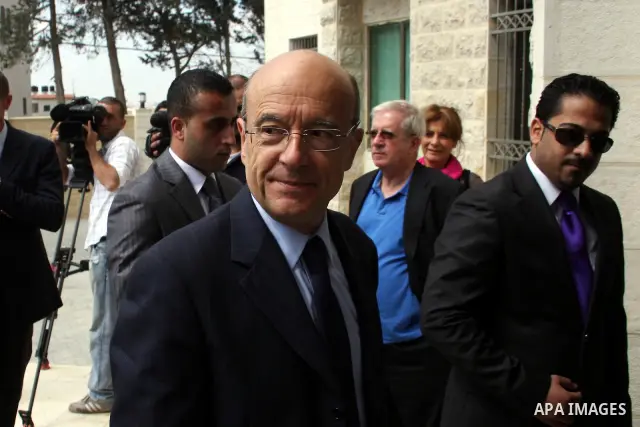 France's Foreign Minister, Alain Juppe during a visit in the West Bank city of Ramallah on June 2, 2011. Photo by Issam Rimawi