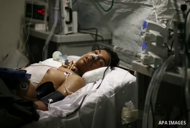 Wounded Libyan rebels were put under medical surveillance at a temporary Intensive Care Unit set up on a ship evacuating injured residents and stranded foreign refugees from the city of Misrata to Benghazi, in the Medite...