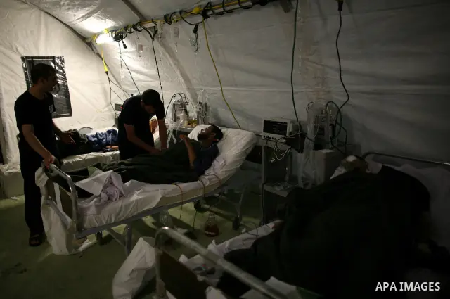 Wounded Libyan rebels were put under medical surveillance at a temporary Intensive Care Unit set up on a ship evacuating injured residents and stranded foreign refugees from the city of Misrata to Benghazi, in the Medite...