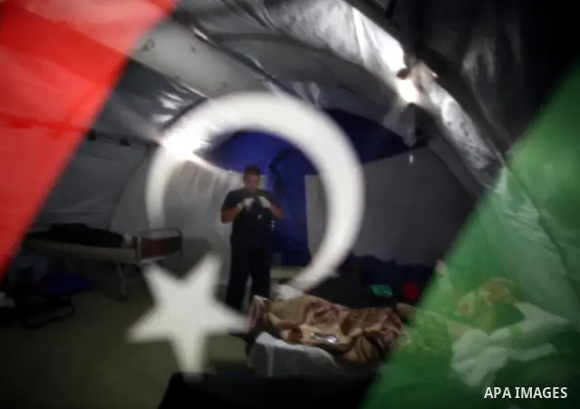 Wounded Libyan rebels were put under medical surveillance at a temporary Intensive Care Unit set up on a ship evacuating injured residents and stranded foreign refugees from the city of Misrata to Benghazi, in the Medite...