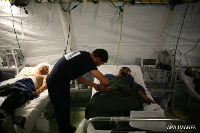 Wounded Libyan rebels were put under medical surveillance at a temporary Intensive Care Unit set up on a ship evacuating injured residents and stranded foreign refugees from the city of Misrata to Benghazi, in the Medite...