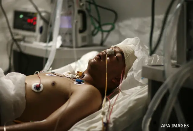 Wounded Libyan rebels were put under medical surveillance at a temporary Intensive Care Unit set up on a ship evacuating injured residents and stranded foreign refugees from the city of Misrata to Benghazi, in the Medite...