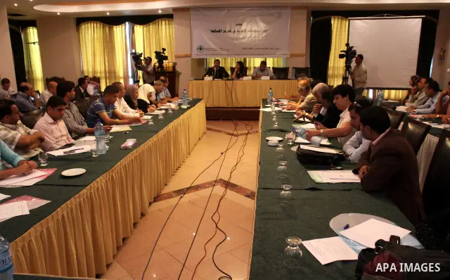 Palestinians participate in a meeting to discuss the role of NGOs in the Palestinian reconciliation between Fatah and Hamas in Gaza city on June 8,2011. Photo by Mohammed Asad