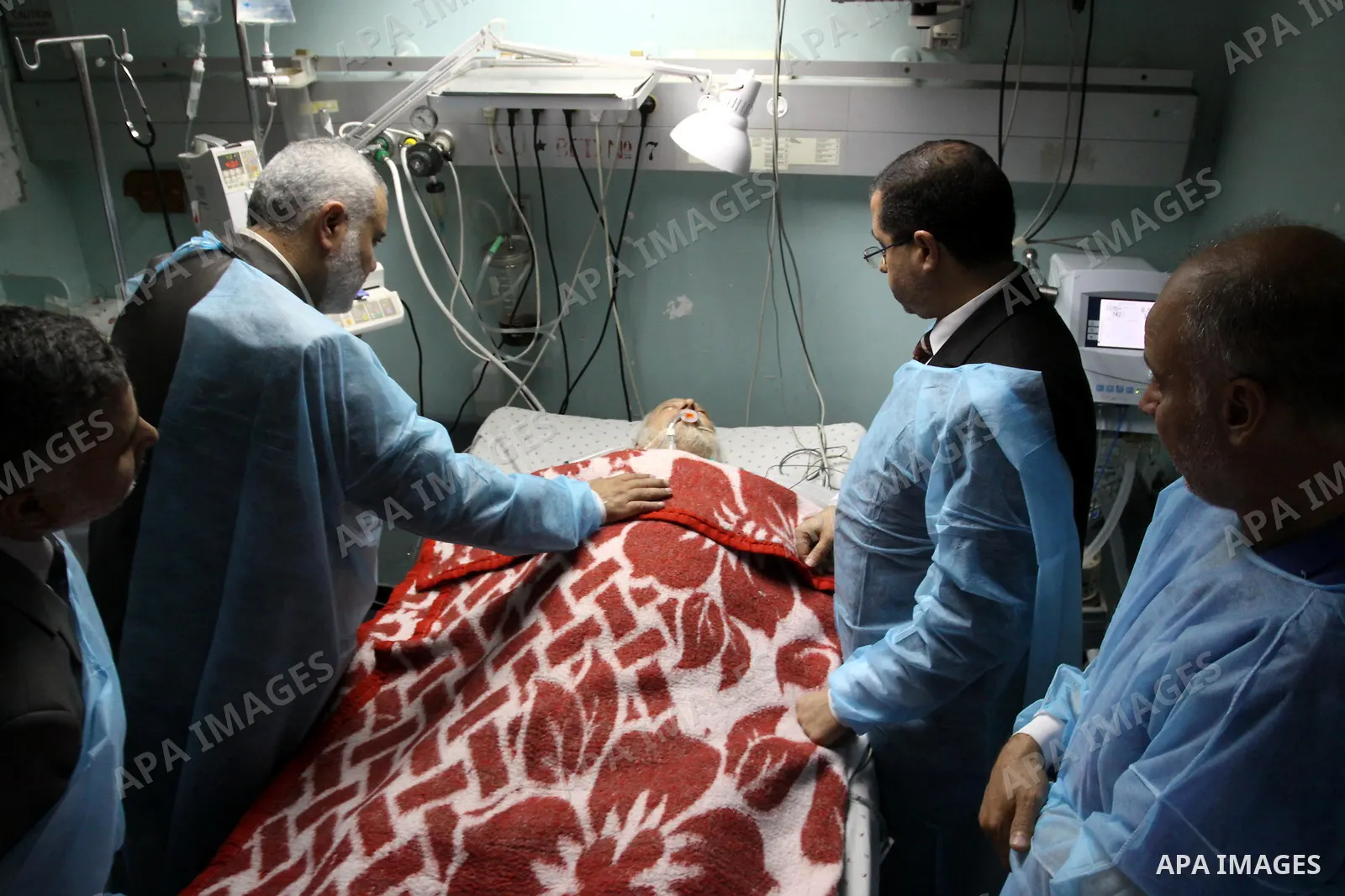 Palestinian Prime Minister in Gaza Strip, Ismail Haniya visits Mohammed Shamaa, one of the founders of Hamas Movement, at Al-Shefa Hospital in Gaza City on June 8,2011. Photo by Mohammed Asad