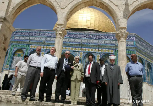Palestinian Grand Mufti, Mohammed Hussein with the former Prime Minister of Norway and his wife tour inside Al-Aqsa mosque compound during their visit to Jerusalem's old city on June 9,2011. Photo by Mahfouz Abu Turk