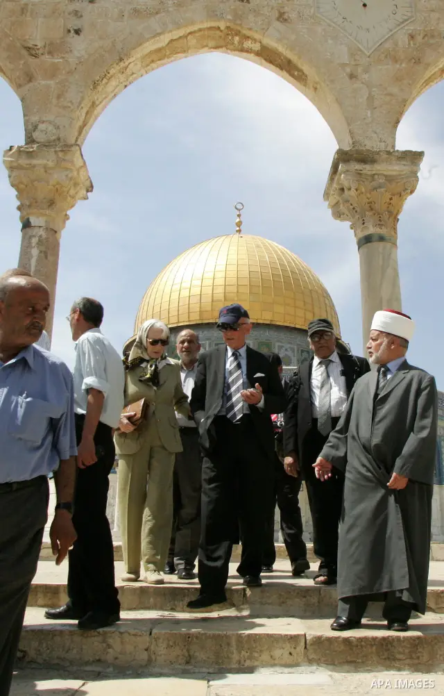 Palestinian Grand Mufti, Mohammed Hussein with the former Prime Minister of Norway and his wife tour inside Al-Aqsa mosque compound during their visit to Jerusalem's old city on June 9,2011. Photo by Mahfouz Abu Turk
