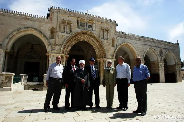 Palestinian Grand Mufti, Mohammed Hussein with the former Prime Minister of Norway and his wife tour inside Al-Aqsa mosque compound during their visit to Jerusalem's old city on June 9,2011. Photo by Mahfouz Abu Turk