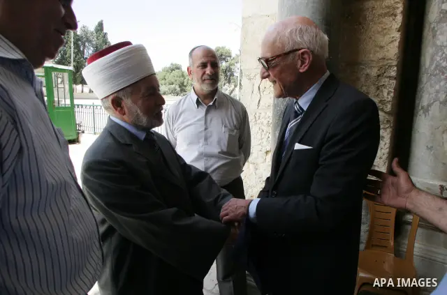 Palestinian Grand Mufti, Mohammed Hussein with the former Prime Minister of Norway and his wife tour inside Al-Aqsa mosque compound during their visit to Jerusalem's old city on June 9,2011. Photo by Mahfouz Abu Turk