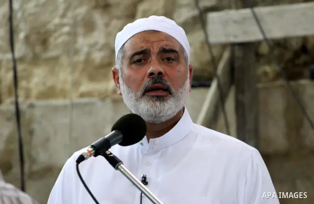 Palestinian Prime Minister in Gaza Strip, Ismail Haniya delivers speech during the funeral of Mohammed Shamaa, one of the Hamas Movement founders, after Friday prayers at Omari mosque in Gaza city on June 10,2011. Photo...