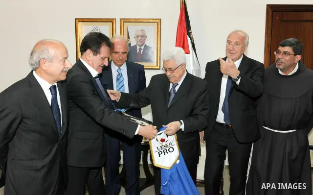 Palestinian President Mahmoud Abbas (Abu Mazen) during a meeting with Vice-President of the Federation of FIFA and the Italian Olympic delegation in the West Bank city of Ramallah on June 11, 2011. Photo by Thaer Ganaim