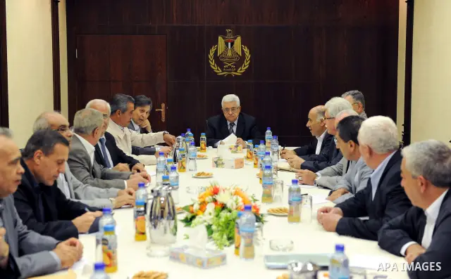 Palestinian President Mahmoud Abbas (Abu Mazen) heads the meeting of the Central Committee of Fatah movement to discuss candidates for prime minister in the interim government in the West Bank city of Ramallah on June 11...