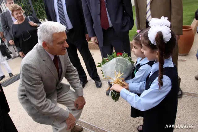 European Parliament President Jerzy Buzek meets Palestinian children during his visit to Deaf Center in Gaza City on June 13, 2011. Photo by Mohammed Asad