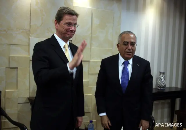 German Foreign Minister Guido Westerwelle meets with Palestinian prime minister Salam Fayyad in the West Bank city of Ramallah during an official visit on June 14, 2011. Photo by Issam Rimawi