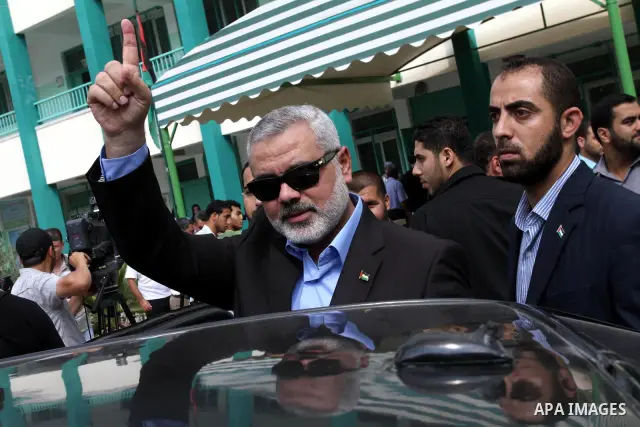 Palestinian Prime Minister in Gaza Strip, Ismail Haniya visits students as they sit for their final high school exams, known as "Tawjihi", in Gaza City on June 15, 2011. Photo by Mohammed Asad