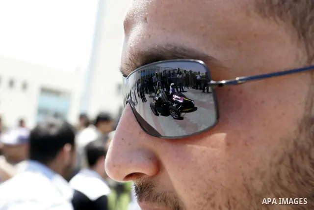 Palestinian students test their Formula 1-style racing car, made from scratch out of recycled parts, they have produced at their technical college run by the United Nations in Khan Yunis, southern Gaza Strip, on June 15,...