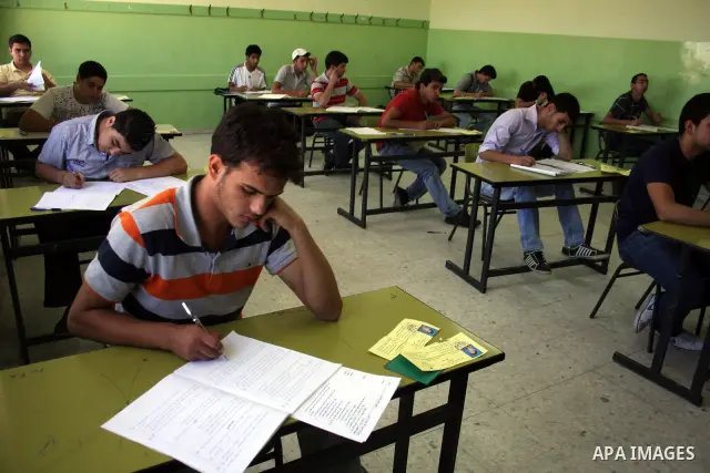 Palestinian students sit for their final high school exams, known as "Tawjihi", in the West Bank city of Ramallah on June 14, 2011. Photo by Issam Rimawi