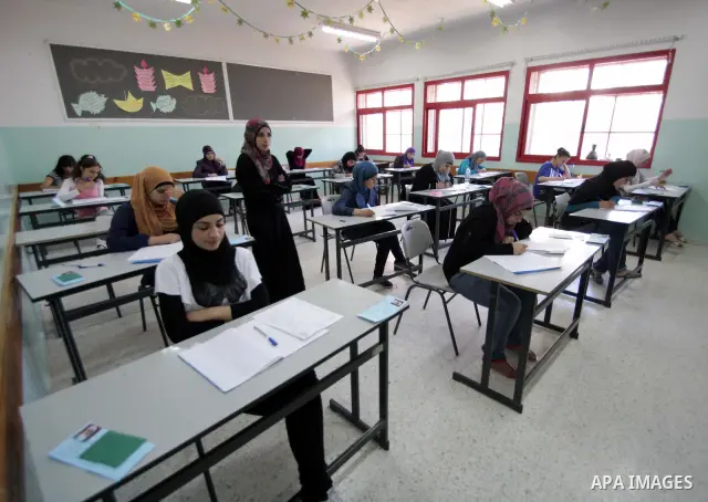 Palestinian students sit for their final high school exams, known as "Tawjihi", in the West Bank city of Bethlehem on June 15, 2011. Photo by STR