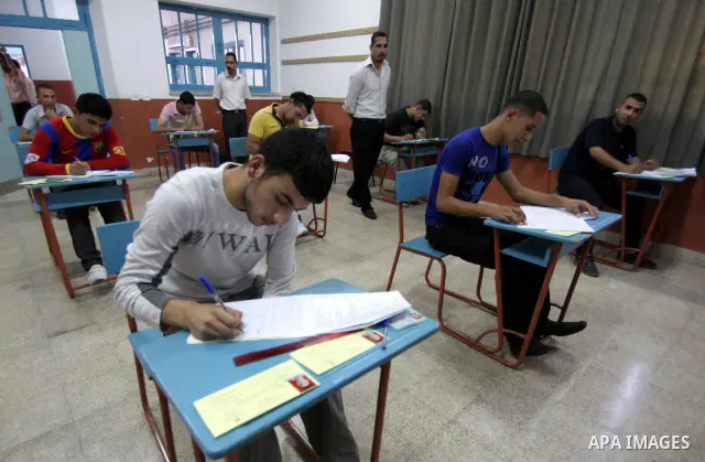 Palestinian students sit for their final high school exams, known as "Tawjihi", in the West Bank city of Bethlehem on June 15, 2011. Photo by STR