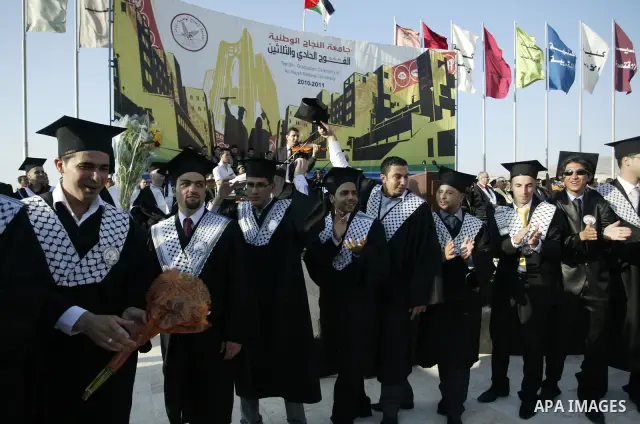 Palestinian students attend a graduation ceremony at the An Najah University in the West Bank city of Nablus ,Wednesday, June 15, 2011. Photo by Wagdi Eshtayah ..
