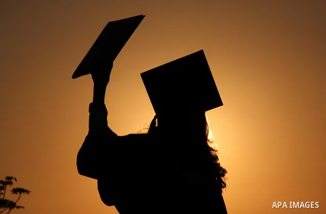 Palestinian students attend a graduation ceremony at the An Najah University in the West Bank city of Nablus ,Wednesday, June 15, 2011. Photo by Wagdi Eshtayah ..