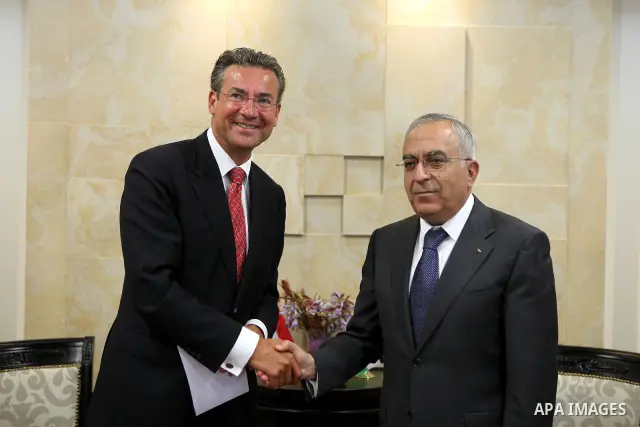 Palestinian Prime Minister, Salam Fayyad during a meeting with deputy Prime Minister in Netherland, Maxime Verhagen in the West Bank city of Ramallah on June 16, 2011. Photo by Mustafa Abu Dayeh