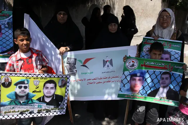 Palestinian jailed relatives take part in a protest calling for the release of Palestinian and Egyptian prisoners from the Israeli jails in front of the Egyptian Embassy in Gaza City on June 16, 2011. Photo by Mohammed A...