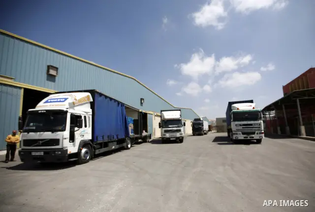 Palestinian Ministry of Health during moving convoy of twenty trucks carrying medicine to Gaza Strip from the west bank city of Nablus on June 18, 2011. Photo by Wagdi Eshtayah . ..
