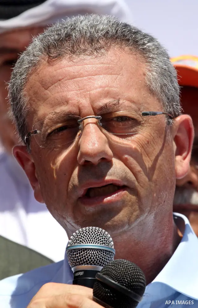 The head of Palestinian National Initiative movement, Mustafa al-Barghuti delivers speech during a rally to mark the ninth anniversary of the movement foundation in Gaza city on Jun 18,2011. Photo by Mohammed Asad