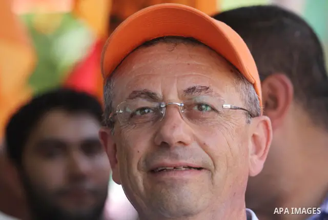 The head of Palestinian National Initiative movement, Mustafa al-Barghuti participates in a rally to mark the ninth anniversary of the movement foundation in Gaza city on Jun 18,2011. Photo by Mohammed Asad