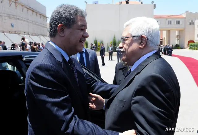 Palestinian President Mahmoud Abbas (Abu Mazen) during a meeting with the Dominican counterpart Leonel Fernandez in the West Bank city of Ramallah on June 19, 2011. Photo by Thaer Ganaim