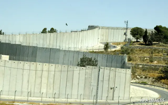 A view for a part of Israel's controversial separation barrier in jerusalem town of kubsa on June 19,2011. Israel says the projected 723 kilometres (454 miles) of steel and concrete walls, fences and barbed wire are need...