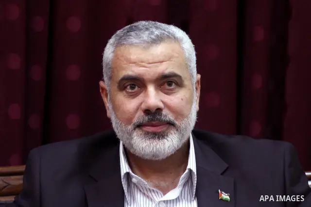 Palestinian Prime Minister in Gaza, Ismail Haniya during a meeting with the head of Palestinian National Initiative movement Mustafa Al-Barghuti in Gaza city on June 19, 2011. Photo by Mohammed Asad