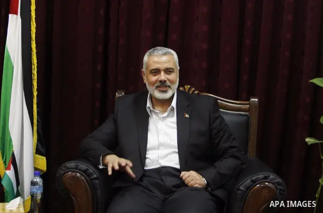 Palestinian Prime Minister in Gaza, Ismail Haniya during a meeting with the head of Palestinian National Initiative movement Mustafa Al-Barghuti in Gaza city on June 19, 2011. Photo by Ali Jadallah