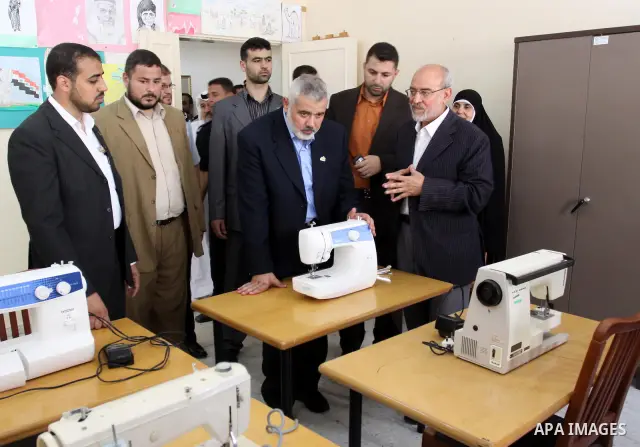 Palestinian prime minister in Gaza Strip, Ismail Haniya attends the opening of Aman centre for Palestinian women care in Gaza city on Jun 22,2011. Photo by Mohammed Asad