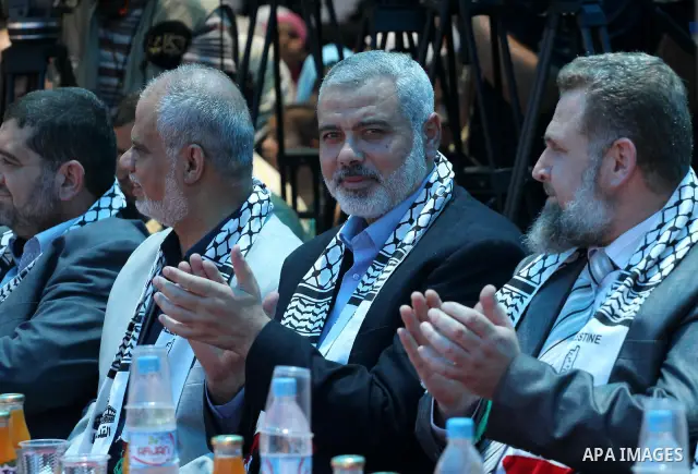 Palestinian prime minister in Gaza Strip, Ismail Haniya attends the opening of the first school in Palestine for deaf students, in Gaza city on Jun 22,2011. Photo by Mohammed Asad