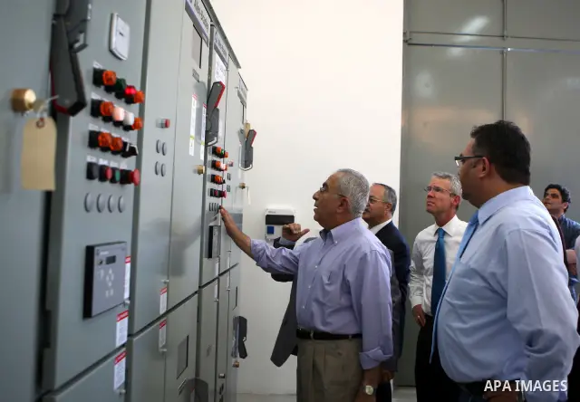 Palestinian prime minister Salam Fayyad attends the inauguration ceremony for well stations rehabilitation project in the southern West Bank village of Tuqu'a, which was financed by the US Agency for international Develo...