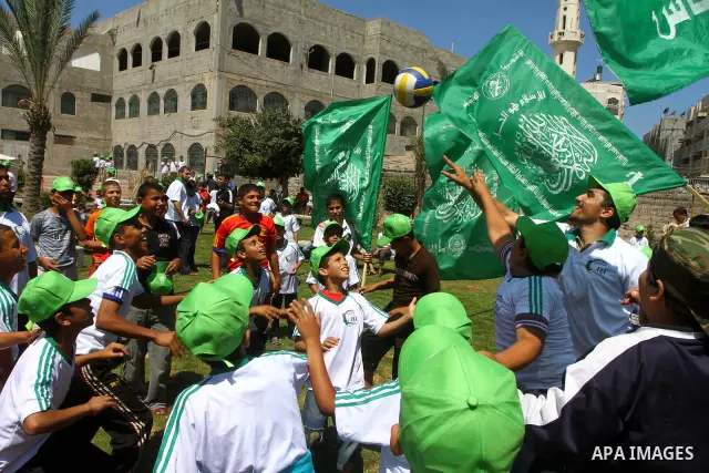 Palestinian boys attend a summer camp organised by the Islamist movement Hamas in Gaza City on June 23, 2011. Photo by Ashraf Amra