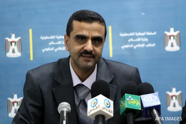 Sohil Emdokh, an official in the Palestinian Ministry of Telecommunication delivers speech during a meeting in Gaza city on 23,2011. Photo by Mohammed Asad