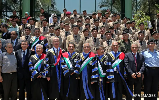 Palestinian Prime Minister, Salam Fayyad attends the graduation ceremony of the students of security, intelligence and the Hebrew language Diploma in the West Bank city of Ramallah on Jun 23,2011. Photo by Mustafa Abu Da...