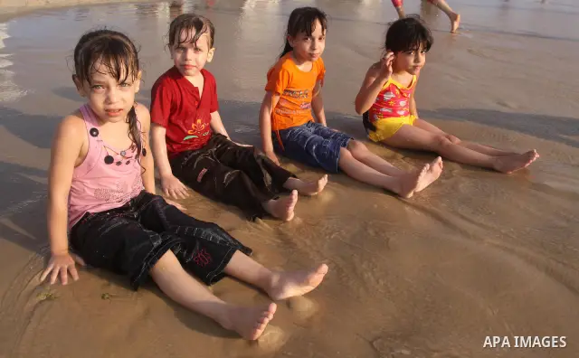 Palestinians enjoy a day at the beach in Gaza City on June 24, 2011. Photo by Mohammed Asad