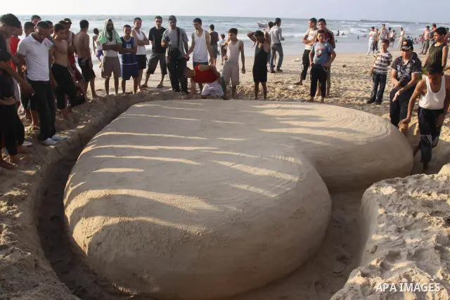 Palestinians enjoy a day at the beach in Gaza City on June 24, 2011. Photo by Mohammed Asad