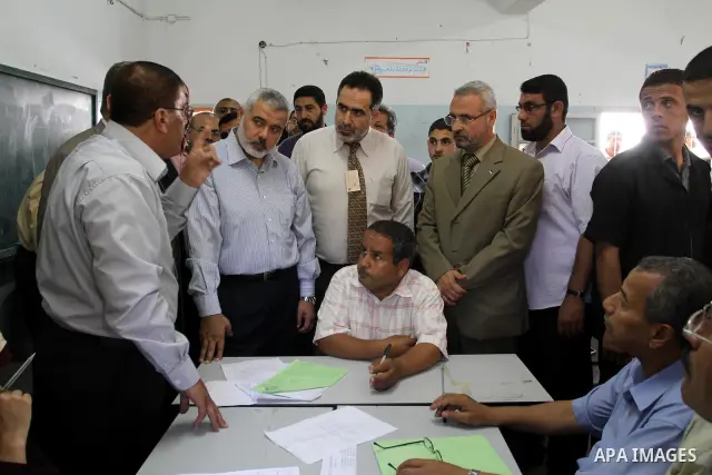 Palestinian Prime Minister in Gaza Strip, Ismail Haniya inspects teachers during correcting the papers of the high school exams known as "Tawjihi" , in Gaza City on June 25, 2011. Photo by Mohammed Asad