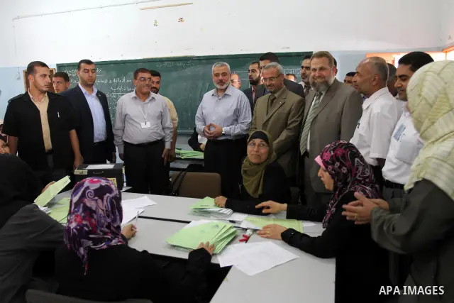 Palestinian Prime Minister in Gaza Strip, Ismail Haniya inspects teachers during correcting the papers of the high school exams known as "Tawjihi" , in Gaza City on June 25, 2011. Photo by Mohammed Asad