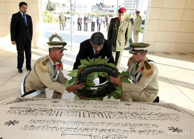 Cypriot Interior Minster, Niculios Saleiots lays a wreath on..the tomb of late Palestinian President Yasser Arafat in the West Bank city of Ramallah on Jun 26,2011. Photo by Mufeed Abu Hasnah