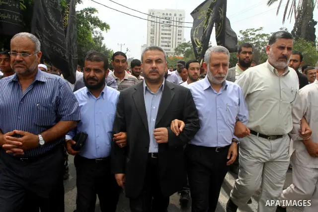 Palestinians shout slogans during a protest in Gaza City calling for the release of Palestinian prisoners held in Israeli jails, on June 27, 2011. Photo by Ashraf Amra