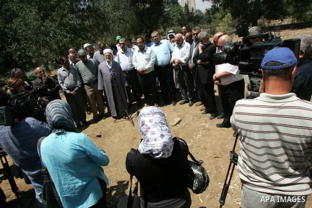 Palestinians and Israeli Arab kenaset members take a part in a protest to the Israeli violations of the Islamic sanctities during a press conference in Jerusalem on June 27, 2011. where washed away and destroyed yesterda...